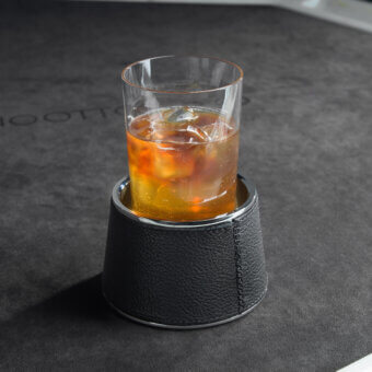 Lavish Impatia Unootto poker table with Italian marble top and Alcantara playing surface, built with chrome legs and a minimalist cup holder