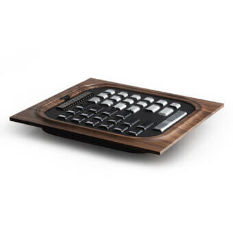 Distinguished Impatia Mossa chess/checkers table crafted with wood, fine leather, glass, and metals in contrasting matte tones with a satin finish