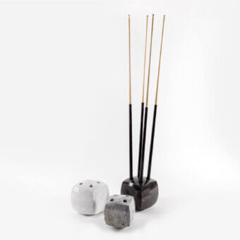 Distinguished Impatia Tocco pool cue rack crafted in Italy with black marble and a polished smooth finish