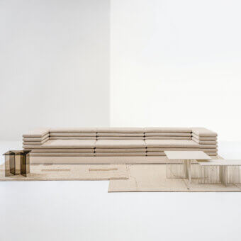 Elegant LaCividina Acamante modular sofa with neutral beige textile upholstery and lined base finish