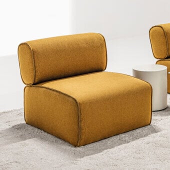 Elegant LaCividina Nhoto lounge chair with textured golden-yellow fabric upholstery and matte finish
