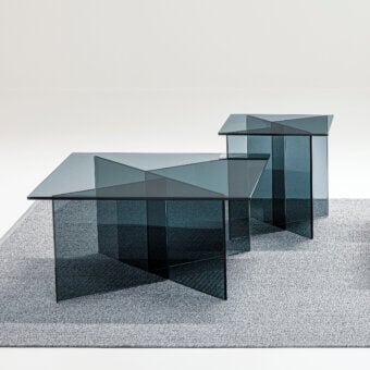 Superior LaCividina Niby coffee side table crafted in dark smoked glass with intersecting planes and smooth finish