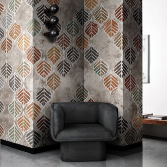 Distinguished LondonArt Fall Arouse wallpaper presents autumnal leaves in muted shades against a marbled background with a contemporary finish