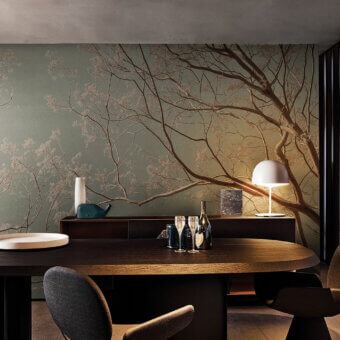 Distinguished LondonArt Patina Bloom wallpaper with delicate branches and blossoms in olive green and gold, paper-based with a matte finish
