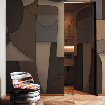 Avant-garde LondonArt Strictly Confidential wallpaper exhibits interlocking brown and beige shapes with a smooth matte finish
