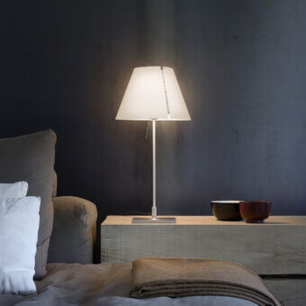 Elegant Luceplan Costanzina table lamp with a lightweight polycarbonate shade and matte white aluminum stem