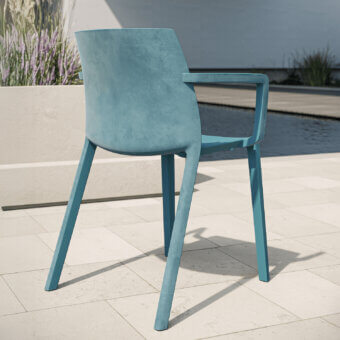 Stylish MY YOUR Ada chair with a textured finish in muted teal, expertly crafted from durable synthetic material in Italy