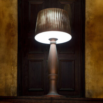 Distinguished MY YOUR Agata floor lamp crafted in wood with a satin finish and vertically ribbed dark brown lampshade