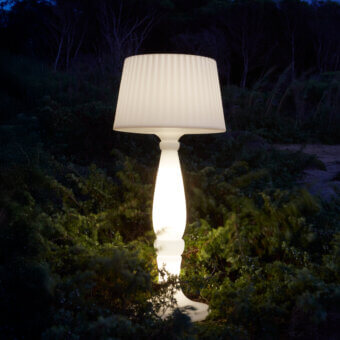 Captivating MY YOUR Agata floor lamp built in durable plastic with a uniformly matte, off-white tone and decorative fluted texture