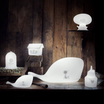 Distinguished MY YOUR Light Tales table lamp set sculpted from translucent white synthetic material with smooth matte finish