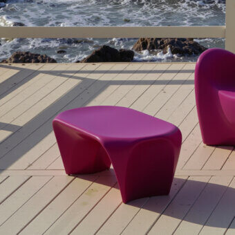 Distinguished MY YOUR Lily coffee table crafted in magenta with organically rounded form and glossy finish