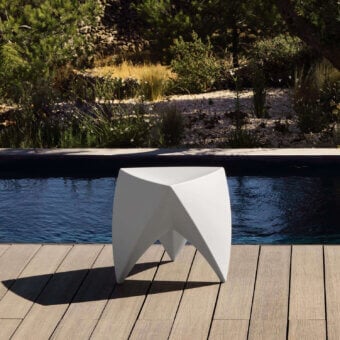 Avant-garde MY YOUR Mr Lem stool in uniformly white Poleasy® evoking a sculptural quality with a seamless finish