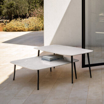Superior MY YOUR Piuma coffee table set with light gray-white marble and matte black metal legs crafted in aluminum with outdoor fabric