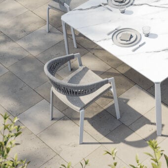 Elegant MY YOUR Italian Outdoor Experience armchair with woven grey textile and white powder-coated aluminum frame