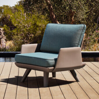 Distinguished MY YOUR Samurai lounge chair with a light beige frame and muted teal water-repellent cushions crafted with recyclable Poleasy modules