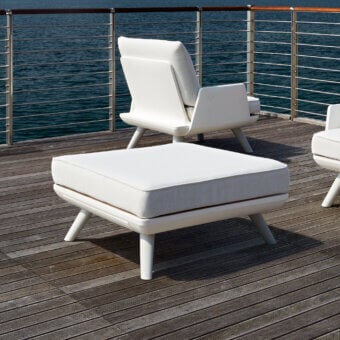 Distinguished MY YOUR Samurai ottoman in off-white textured fabric with a recyclable Poleasy® structural basis and tapered legs