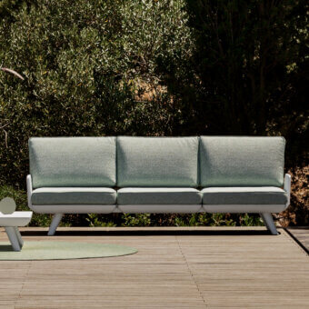 Elegant MY YOUR Samurai sofa with a low rectangular silhouette crafted in water-repellent pale green textured Poleasy® material