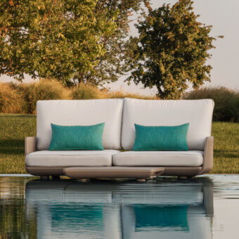 Exceptional MY YOUR Samurai sofa with a brownish-grey woven frame and cream cushions accented with teal fabrics