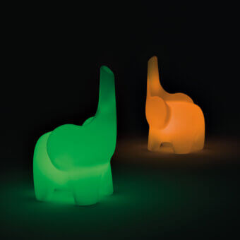 Distinctive MY YOUR Tino chair inspired by an elephant with glossy green Poleasy® material crafted in Italy