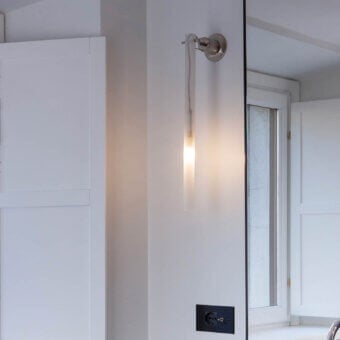 Elegant Nemo Lighting Canna Nuda lamp with slender silver-gray metal and glass construction and satin finish