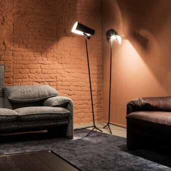 Elegant Nemo Lighting Claritas floor lamp crafted in bent metal tubes and curved aluminum with a matte black finish