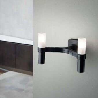 Exceptional Nemo Crown Wall Lamp, a contemporary fixture crafted in dark-toned metal with matte finish and directed cylindrical glass shades