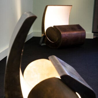 Superior Nemo Escargot floor lamp crafted in burnished brass and aluminum with a satin finish delivering indirect light