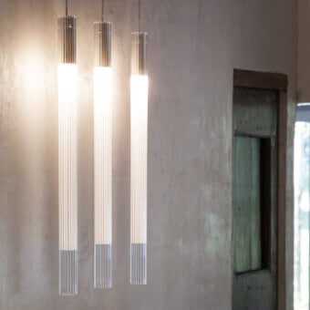 Distinguished Nemo Lighting Ilium suspension lamp built in ribbed glass and aluminum with satin finish delivering diffused illumination