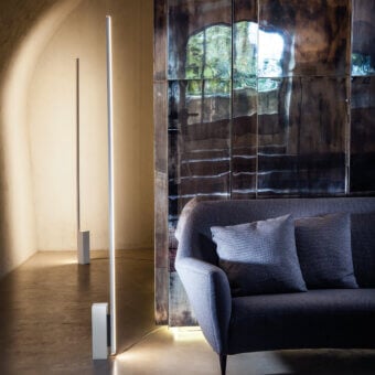 Distinctive Nemo Linescapes floor lamp crafted in aluminum, PC, and ABS with a matte finish delivering warm directional lighting