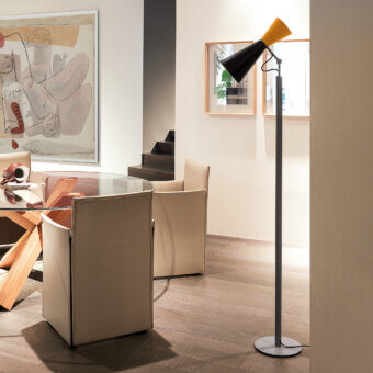 Exceptional Nemo Parliament floor lamp with steel and aluminum construction in matte gray and a two-tone yellow-black shade