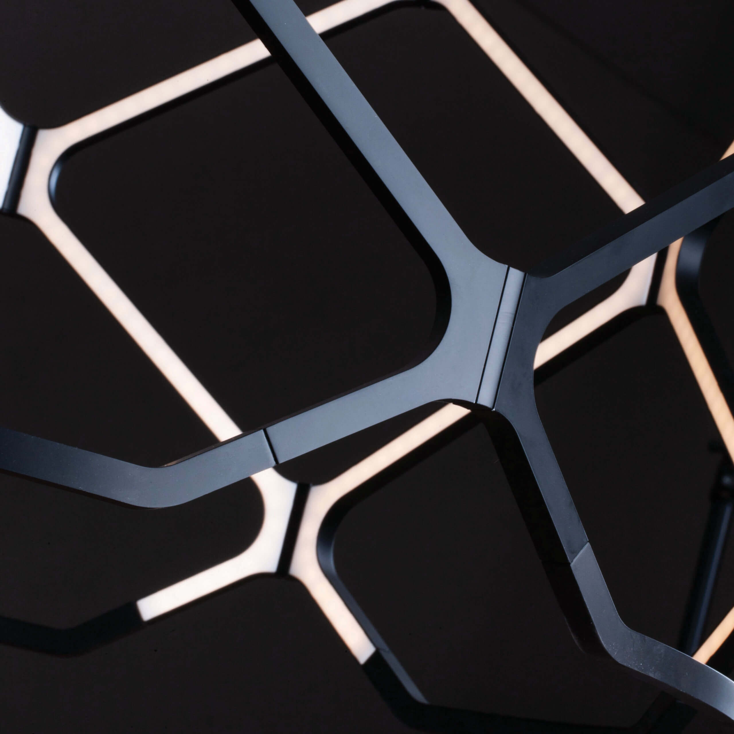 Distinguished Nemo Titia suspension lamp crafted in recycled polymer and dark metal with a matte finish illuminating diffused glow