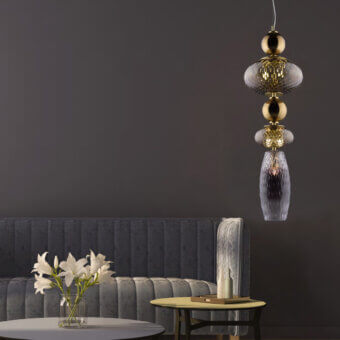 Exceptional Euroluce Harmony suspension lamp crafted in Italy with mirrored brown and soft rosaline borosilicate glass shades and warm gold metal