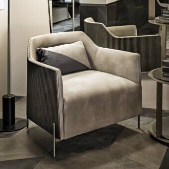 Exceptional Shake Hege lounge chair with curved ash-plywood frame, muted grey textile upholstery and varnished steel legs in a satin tone