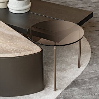 Distinguished Shake Lily coffee table with varnished steel base and transparent tempered glass top in dark brown and clear tones