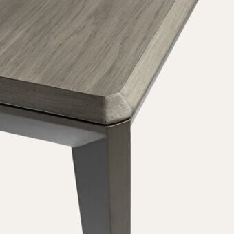 Distinguished Shake New York table crafted with linden wood and blockboard ash in muted gray with a matte finish
