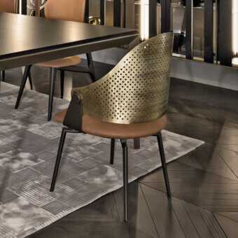 Exceptional Shake Roma armchair crafted with varnished steel, perforated burnished brass, and tan acrylic fiber upholstery