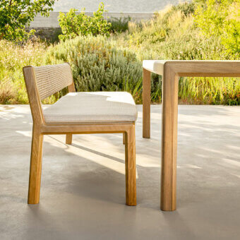 Distinguished Varaschin Gianna bench crafted in durable Iroko wood with woven textile backrest and smooth satin finish