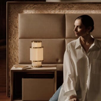 Lavish Visionnaire Aubade nightstand crafted in warm beige leather with satin finish and brass edging