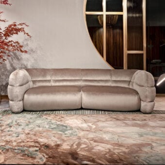 Lavish Visionnaire Bomber sofa upholstered in plush matte dusty rose textile with uniquely padded chambers