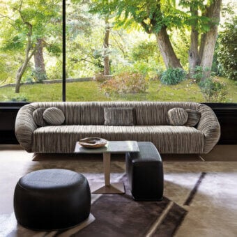 Exceptional Visionnaire Citizen sofa built with solid wood and multilayer frame, upholstered in textured neutral gray textile with goose down quilt