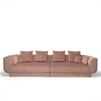 Superior Visionnaire Foster sofa with muted rose textile upholstery, curved volumes and matte finish