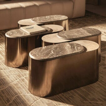 Sophisticated Visionnaire Sollis coffee table with light beige marble “leather” and satin bronze welded metal base