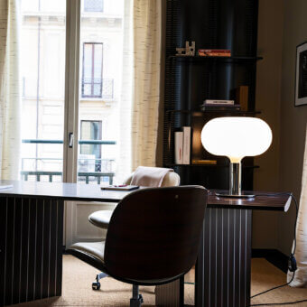 Distinguished Nemo AM1N table lamp in white hand-blown glass with a dark gray satin metal base and support