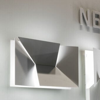Exceptional Nemo Lighting Wall Shadows wall lamp crafted with laser-cut aluminum and a matte white painted finish producing dramatic shadows