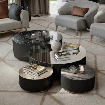 Elegant Bizzotto Italia Ikat coffee table with ceramic marble-effect tabletop and dark base featuring metallic bronze accents