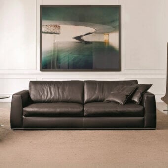 Distinguished CTS Salotti Andy sofa in dark brown leather with clean lines and a minimalist aesthetic crafted in Italy