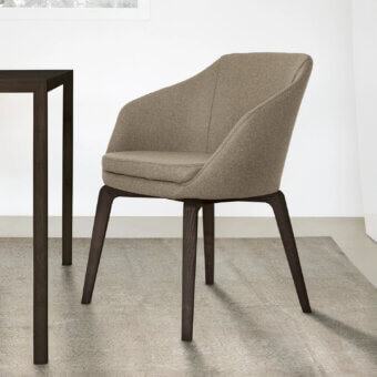 Distinguished CTS Salotti Anna armchair upholstered in warm gray-brown fabric with a natural stained ash wood base