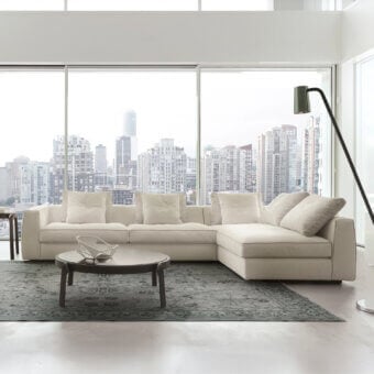 Exceptional CTS Salotti Clay sectional upholstered in light neutral beige textile with a subtly textured finish