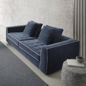 Superior CTS Salotti Clay sofa with deep navy blue fabric upholstery and contrasting white stitching, built with a stained beech base