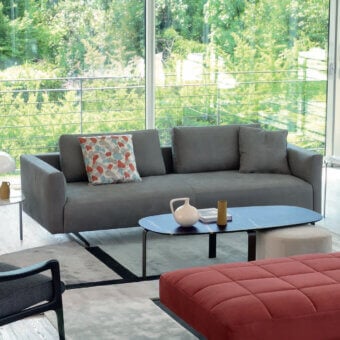 Superior CTS Salotti Ikon sofa with medium gray textile upholstery and a matte finish, accented by patterned cushions